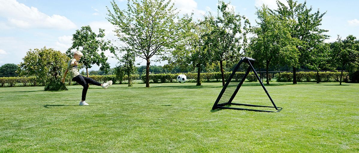 Image of a football player training with the exit rebounder.